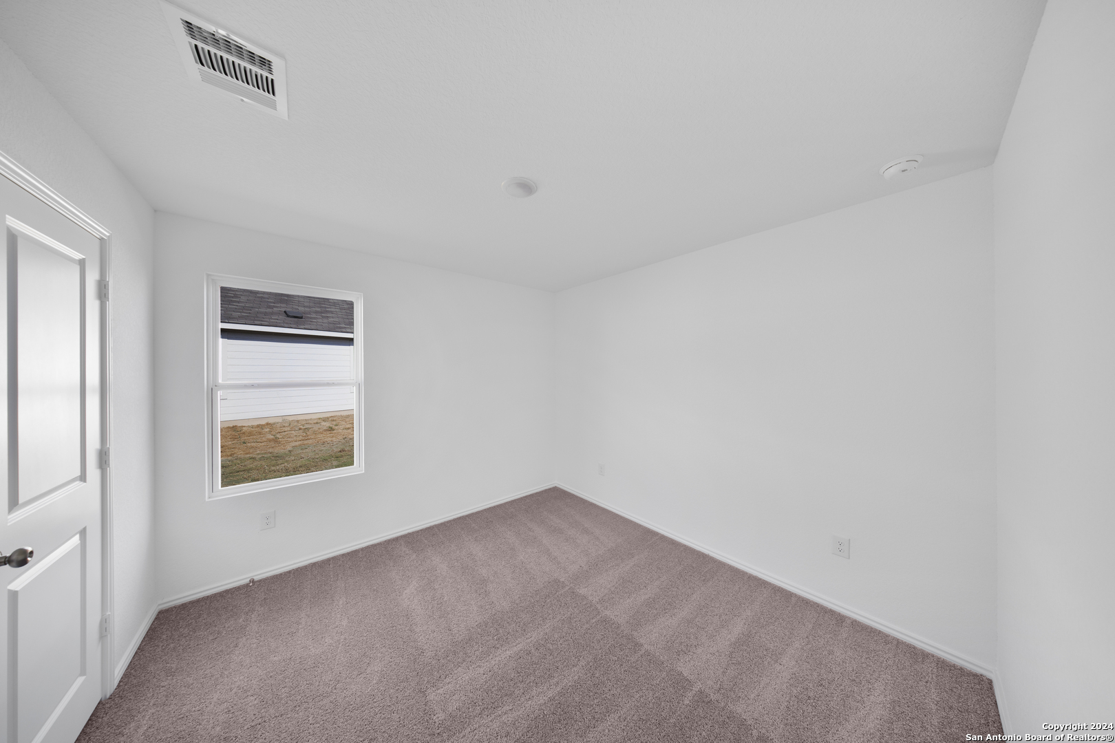 13611 Appleton Way San Antonio, TX 78253 - Photo 9 of 12 an empty room with a window