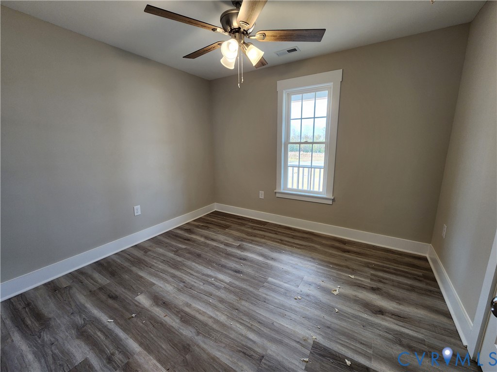 Lot 2 Owens Mill Road St. Stephens Church, VA 23148 - Photo 14 of 20 wooden floor in an empty room with a window