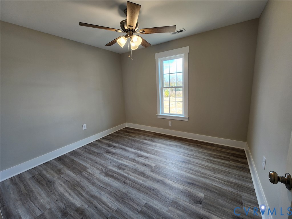 Lot 2 Owens Mill Road St. Stephens Church, VA 23148 - Photo 15 of 20 wooden floor in an empty room with a window