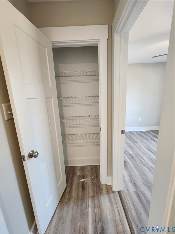 Lot 2 Owens Mill Road St. Stephens Church, VA 23148 - Photo 16 of 20 a view of walk in closet with wooden floor