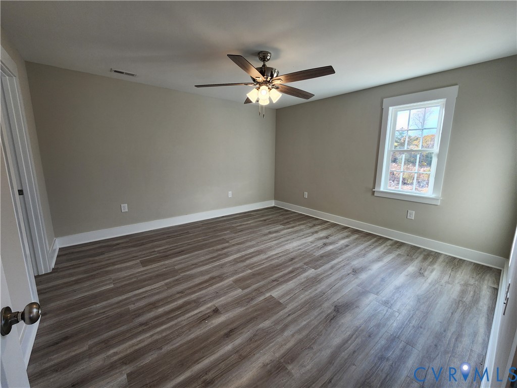 Lot 2 Owens Mill Road St. Stephens Church, VA 23148 - Photo 17 of 20 wooden floor in an empty room with a window
