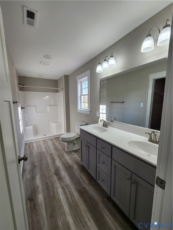 Lot 2 Owens Mill Road St. Stephens Church, VA 23148 - Photo 18 of 20 a bathroom with double vanity sink and a mirror