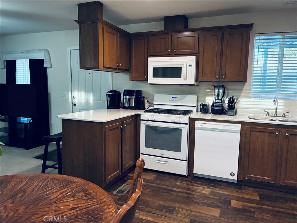 2 Rancho Grande Circle Atwater, CA 95301 - Photo 3 of 14 a kitchen with a sink stove and cabinets