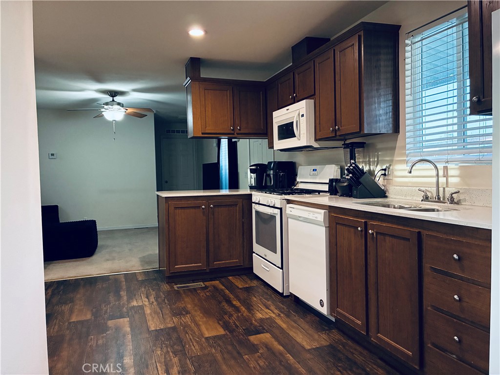 2 Rancho Grande Circle Atwater, CA 95301 - Photo 4 of 14 a kitchen with a sink cabinets and appliances