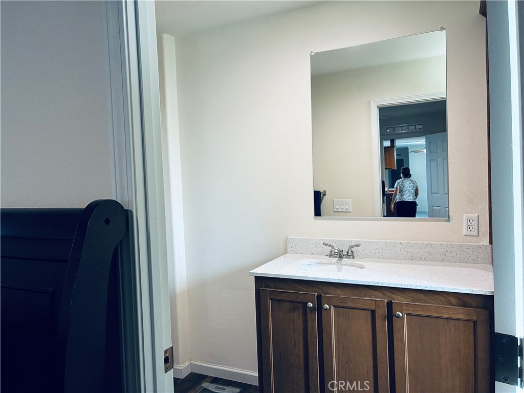 2 Rancho Grande Circle Atwater, CA 95301 - Photo 8 of 14 a bathroom with a sink and a mirror