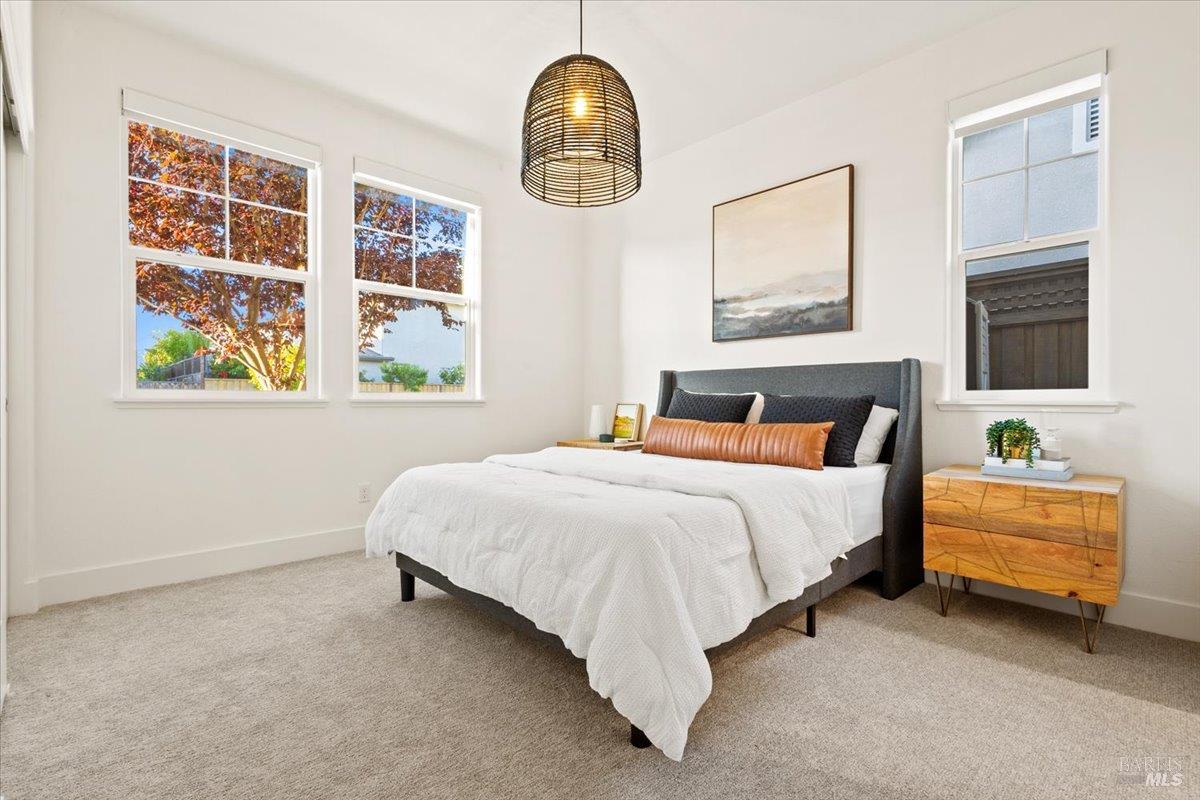 1469 Oak Circle Rohnert Park, CA 94928 - Photo 31 of 42 Main Floor Bedroom Rare Main-Level Bedroom Suite Ideal for guests, multigenerational living, a private office, or extended family, the main-floor bedroom features direct access to its own full bathroom.