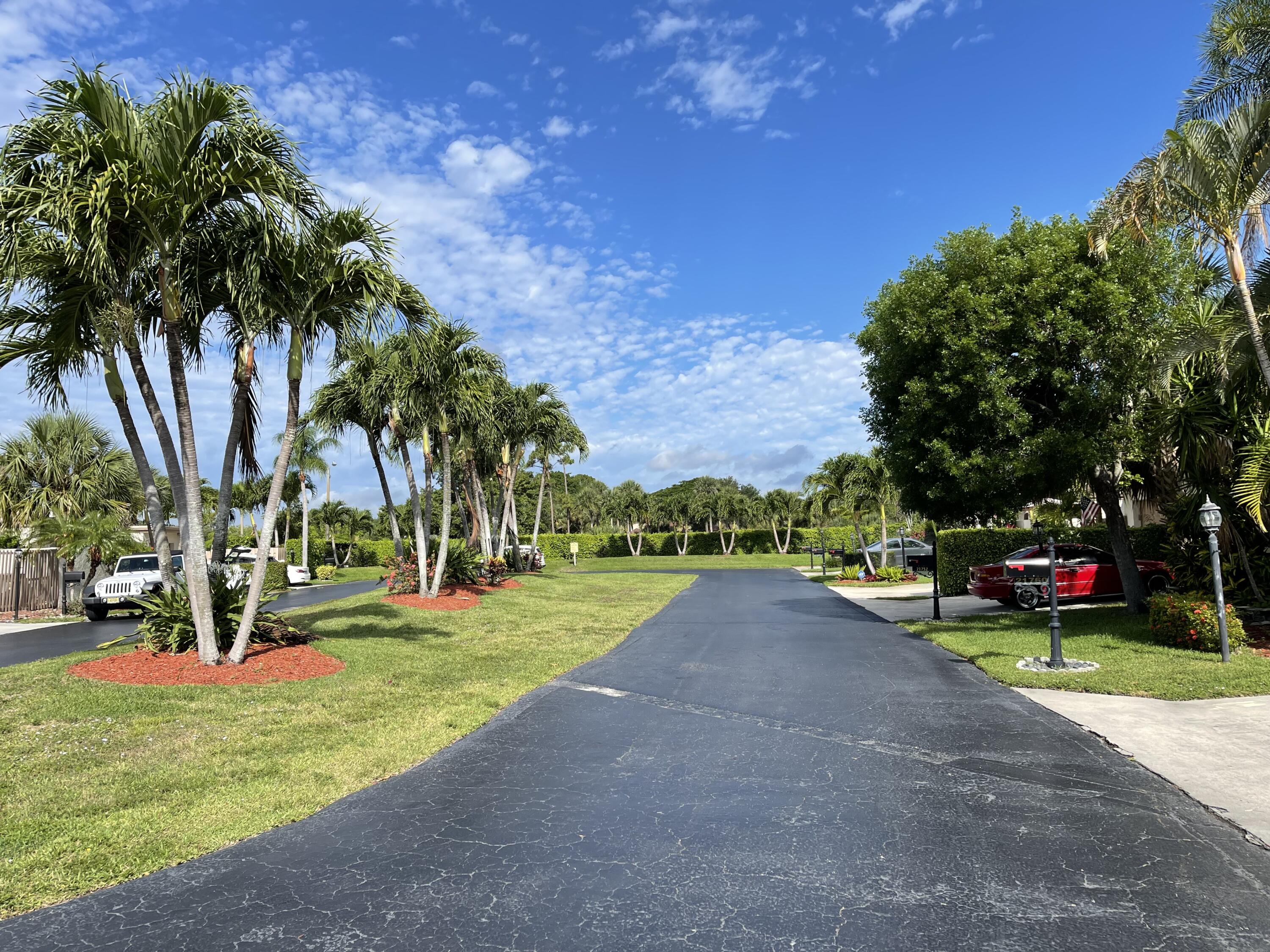 21762 Contado Road Boca Raton, FL 33433 - Photo 3 of 39 W. horseshoe-loop from driveway