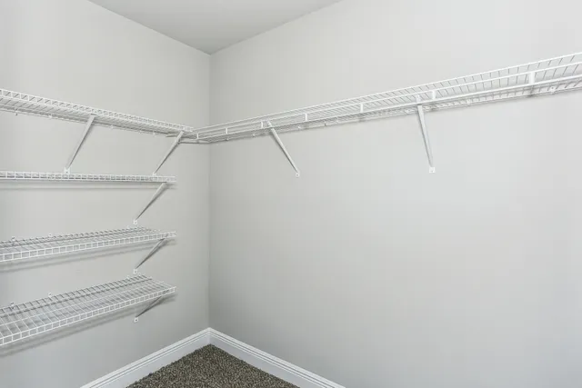 a view of a room with racks on the wall