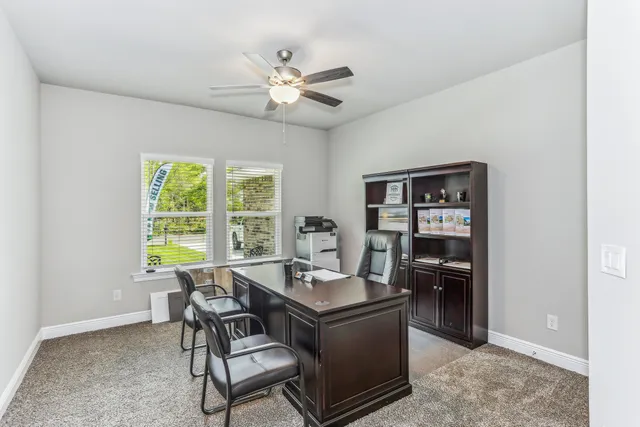 a workspace with furniture and bedroom view