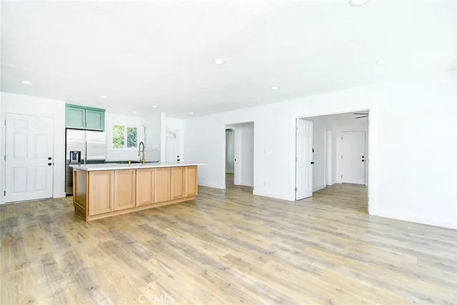 a view of a kitchen with a sink