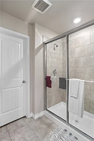 a view of a house with backyard sitting area and garden