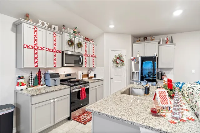 a view of a dining room with furniture and window
