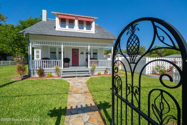 a view of a backyard with a bench