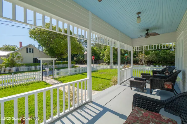 a kitchen with granite countertop a sink stainless steel appliances and cabinets