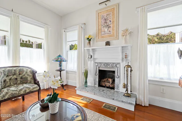 a kitchen with stainless steel appliances granite countertop a refrigerator and a stove