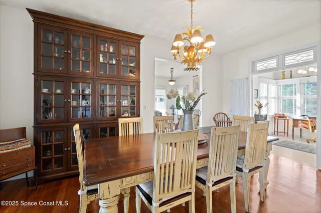 a bed room with a bed and a dresser
