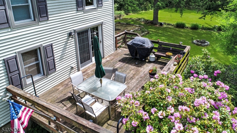 103 Petersburg Road Hackettstown, NJ 07840 - Photo 14 of 18 a backyard of a house with outdoor seating