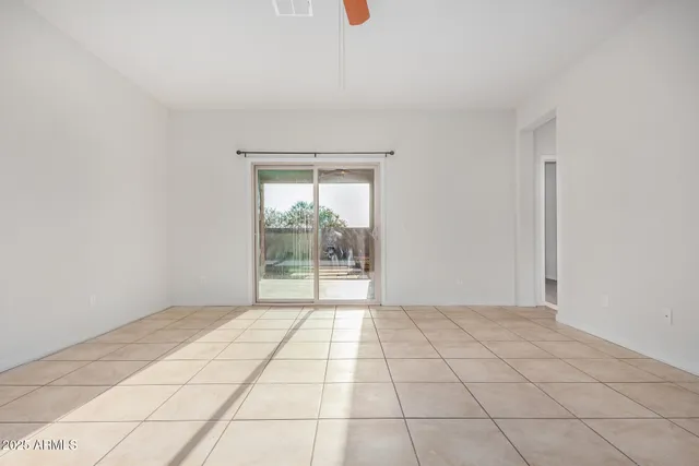 a view of an empty room and window