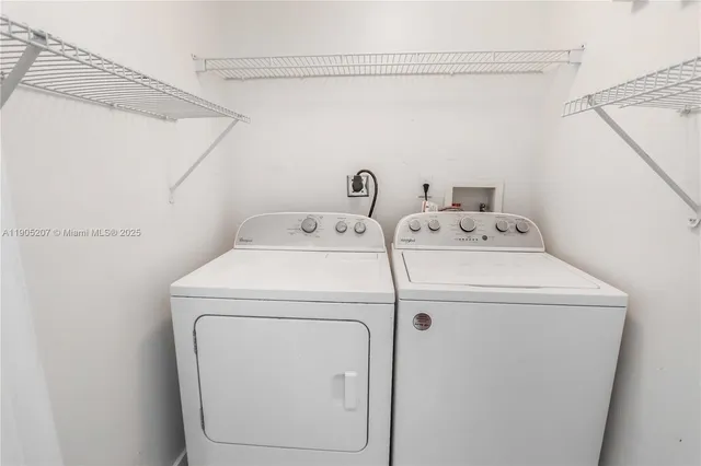 a view of house with yard and swimming pool