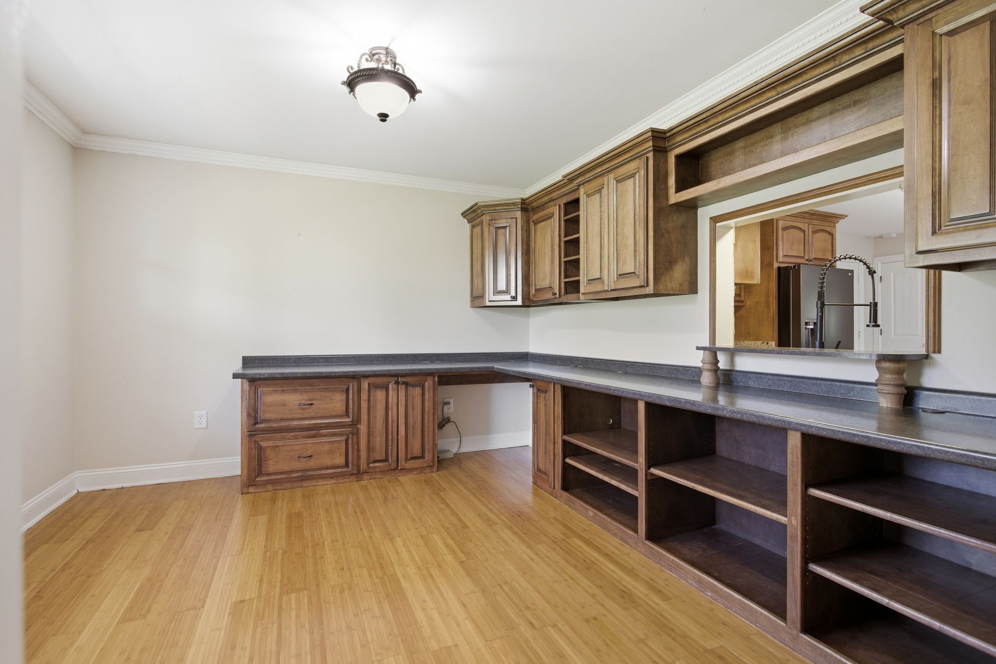 408 Weakley Creek Road Lawrenceburg, TN 38464 - Photo 15 of 41 a kitchen with wooden floors and a sink