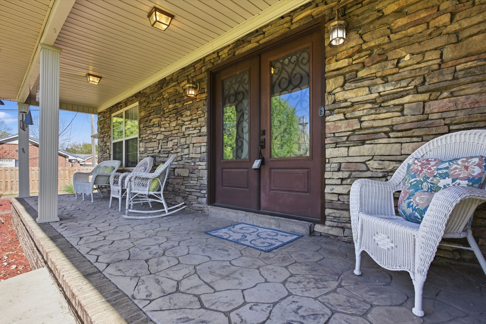 408 Weakley Creek Road Lawrenceburg, TN 38464 - Photo 2 of 41 a building outdoor space with patio furniture and potted plants