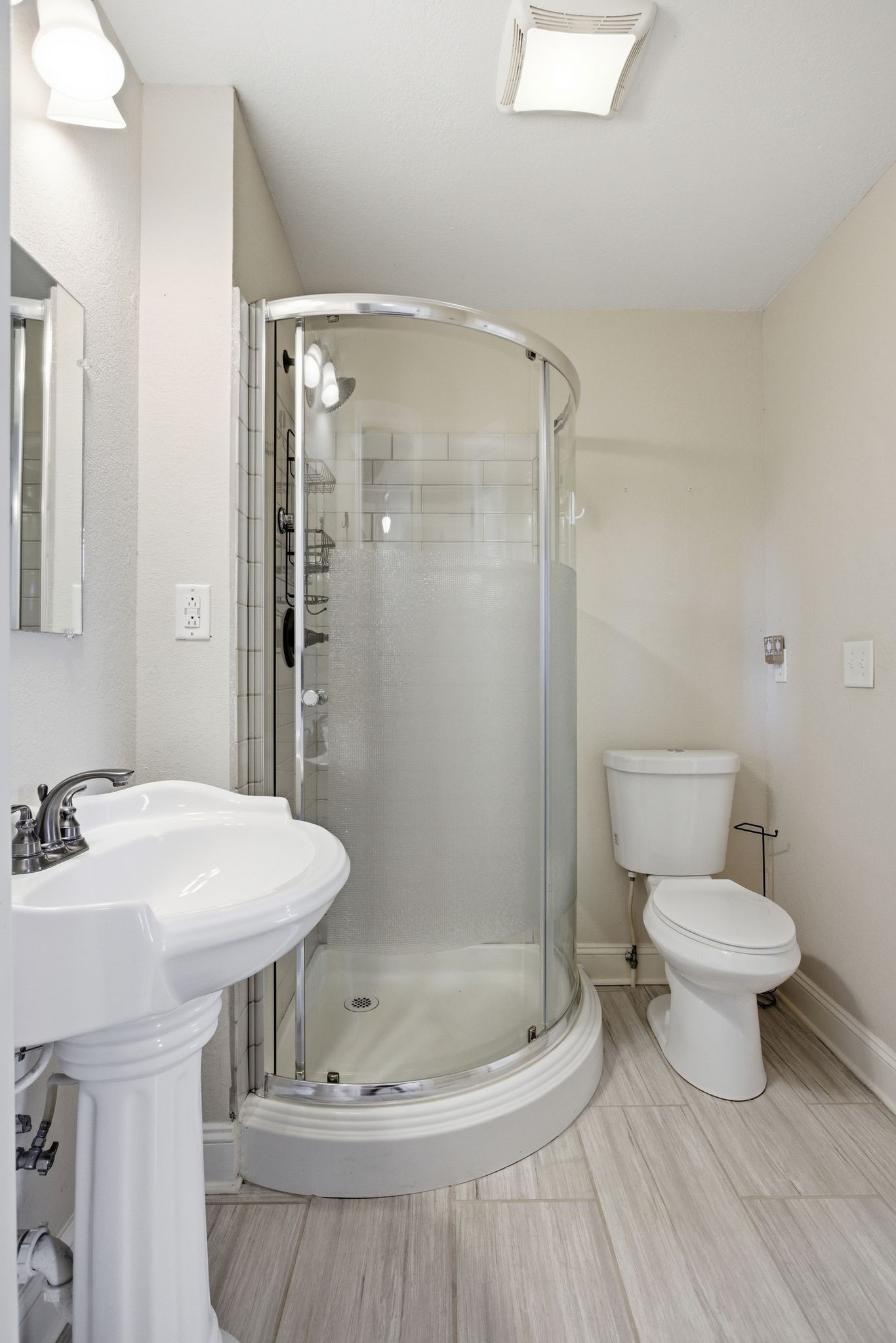 408 Weakley Creek Road Lawrenceburg, TN 38464 - Photo 27 of 41 a bathroom with a sink toilet and shower