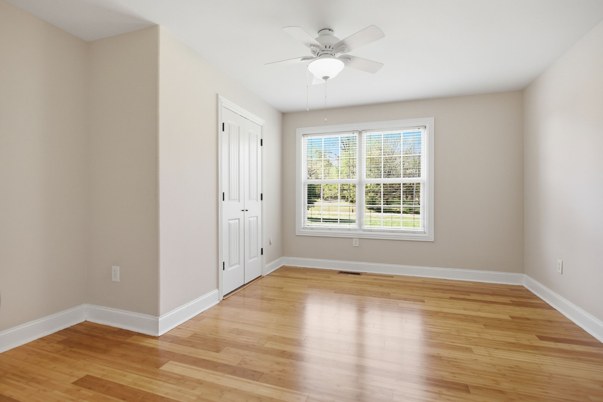 408 Weakley Creek Road Lawrenceburg, TN 38464 - Photo 30 of 41 a view of an empty room with wooden floor and a window