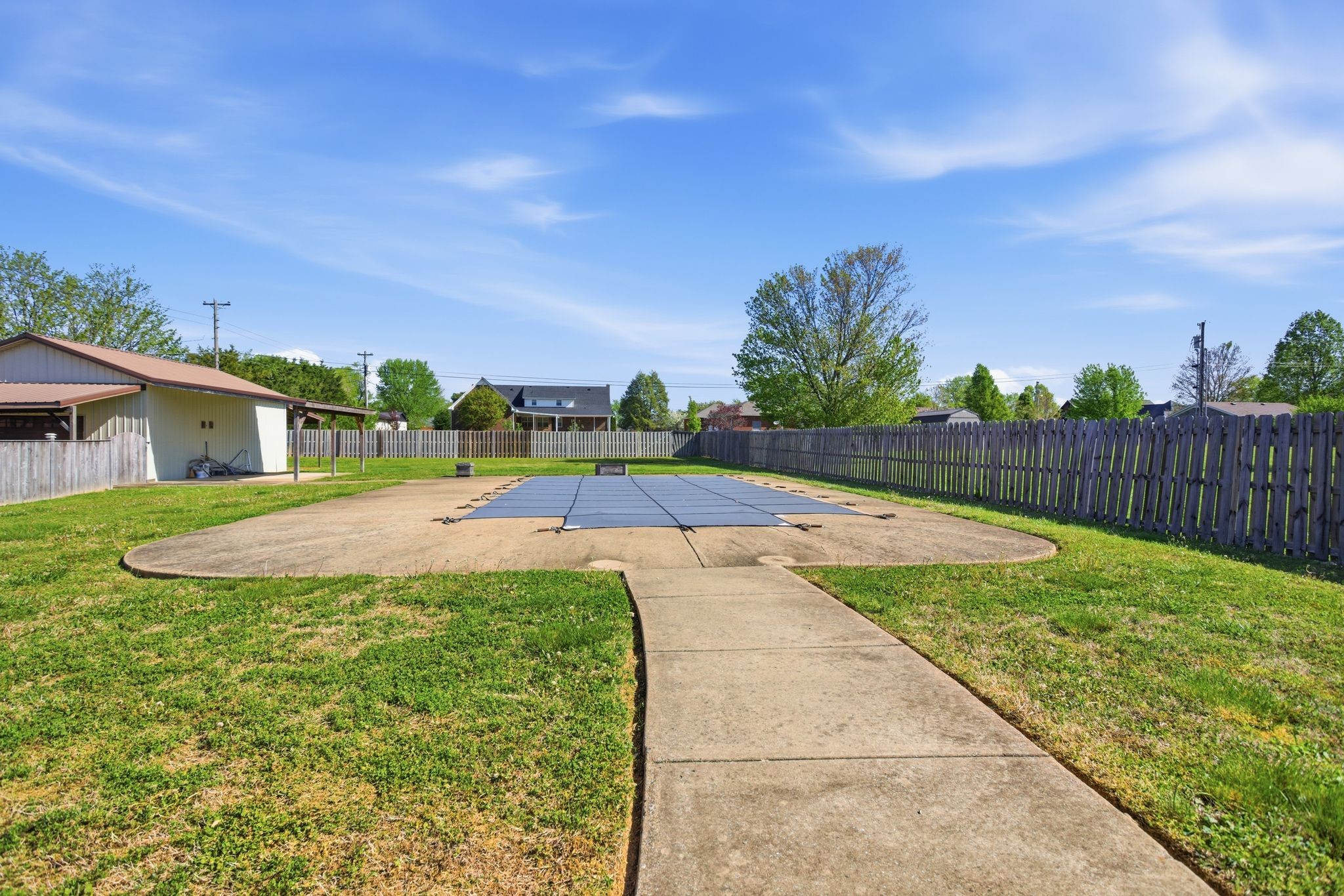 408 Weakley Creek Road Lawrenceburg, TN 38464 - Photo 37 of 41 a view of a house with swimming pool and a yard