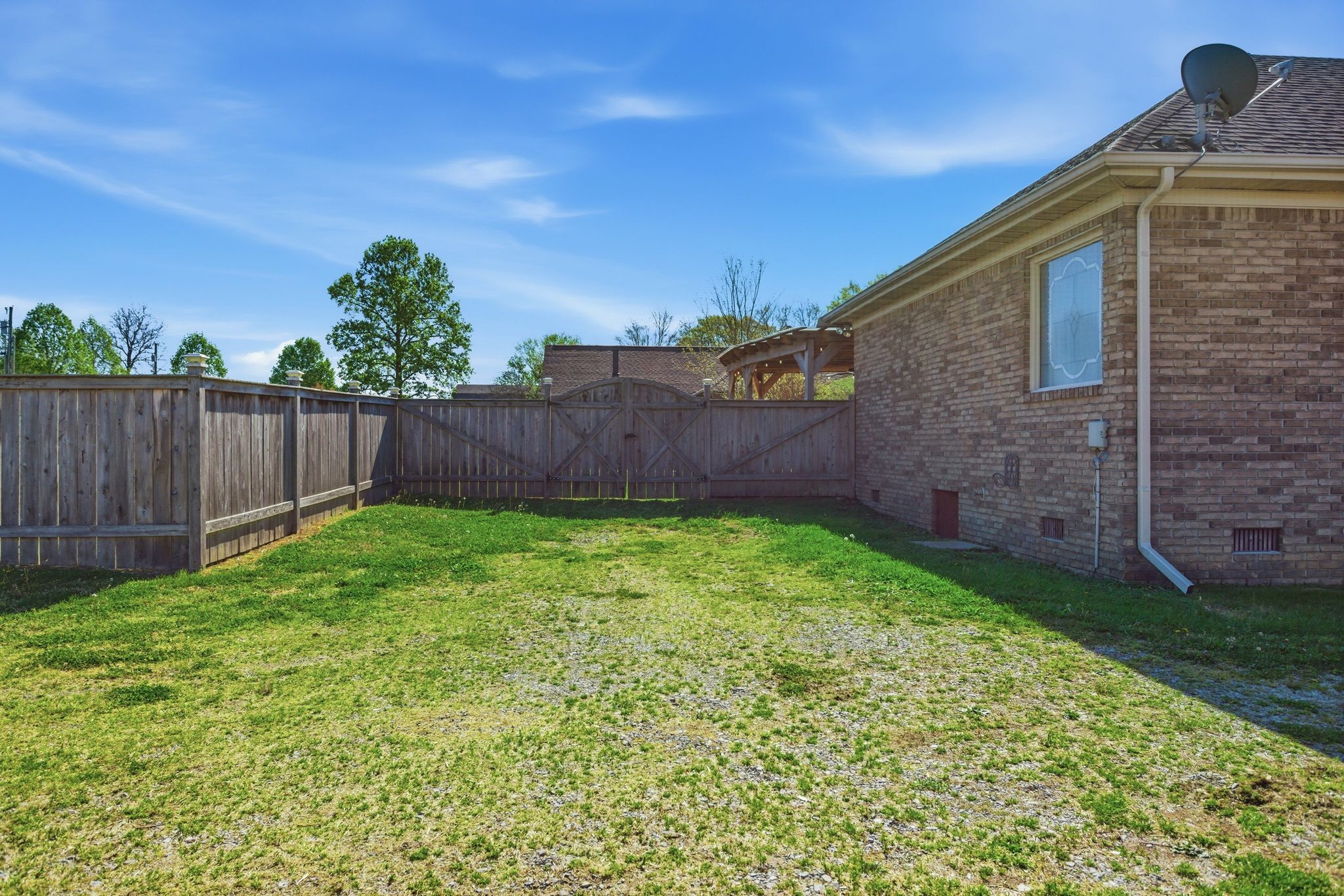 408 Weakley Creek Road Lawrenceburg, TN 38464 - Photo 40 of 41 a backyard of a house with lots of green space