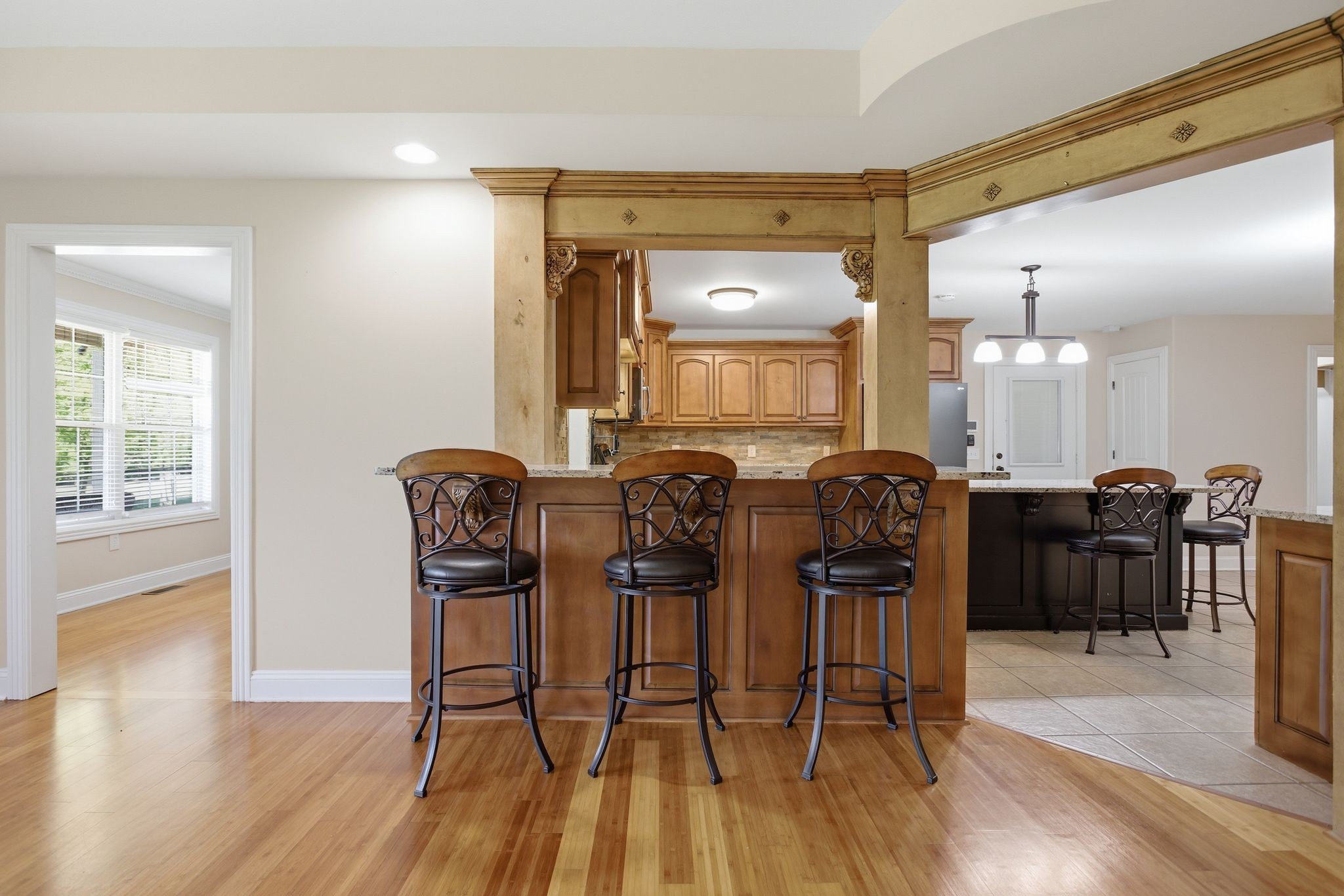 408 Weakley Creek Road Lawrenceburg, TN 38464 - Photo 10 of 41 a view of a dining room with furniture and wooden floor