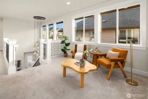 a living room with furniture and a table