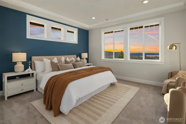 a bedroom with bed and window