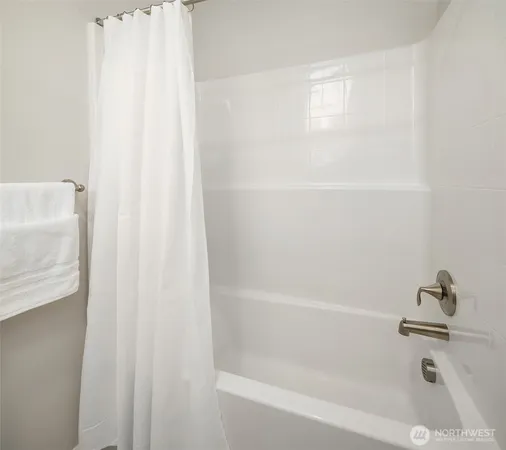 a close up of a bathtub in a bathroom