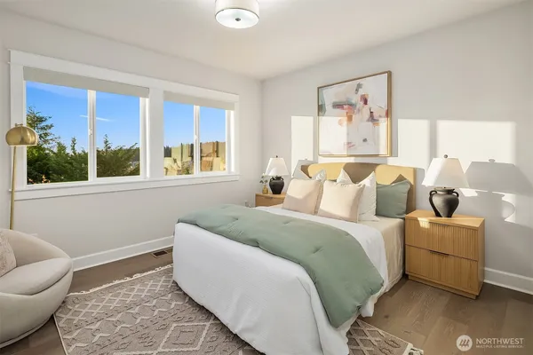 a bed room with a bed and a couch