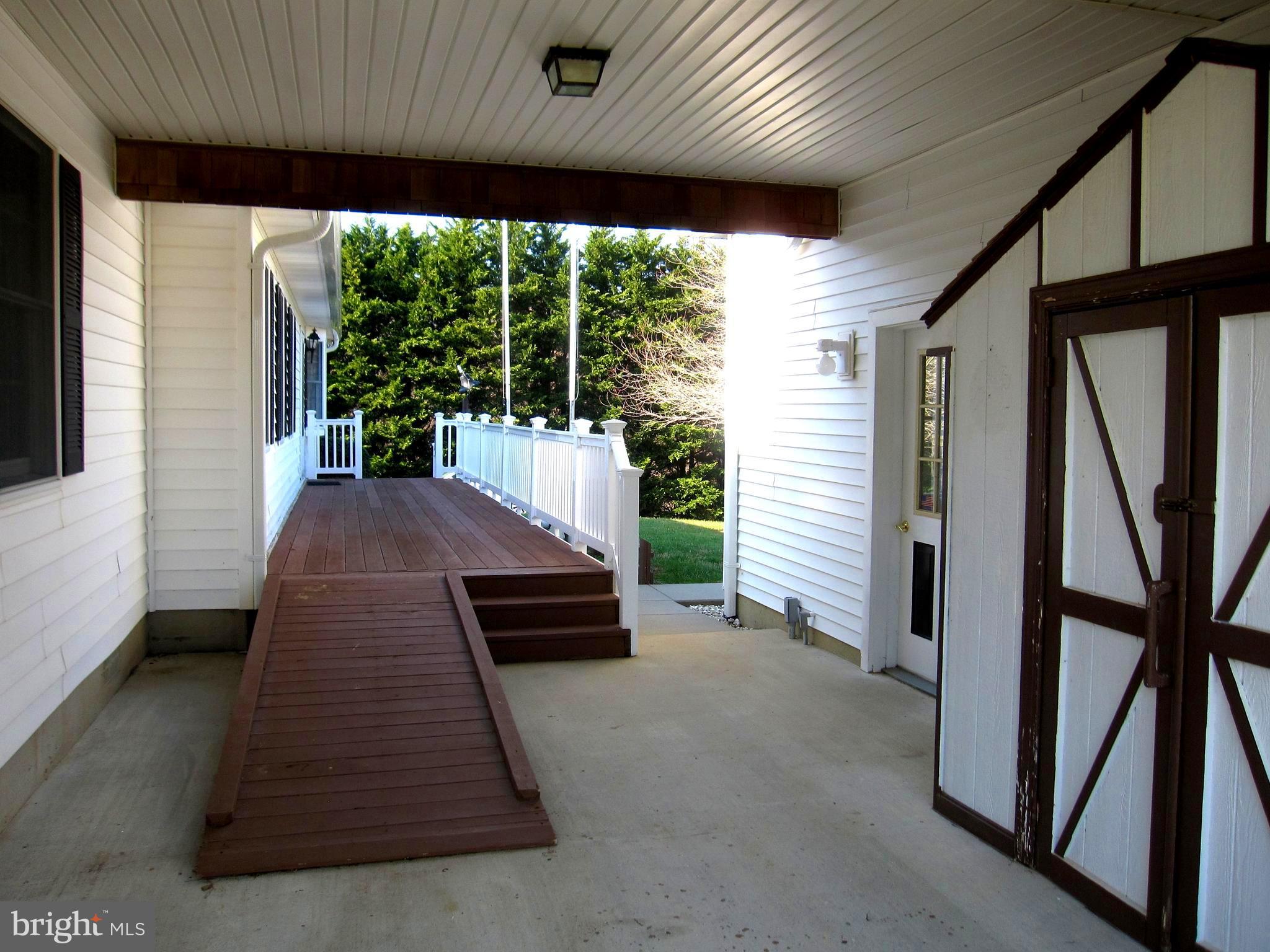 231 Deale Road Tracys Landing, MD 20779 - Photo 39 of 43 a house view with a garden space