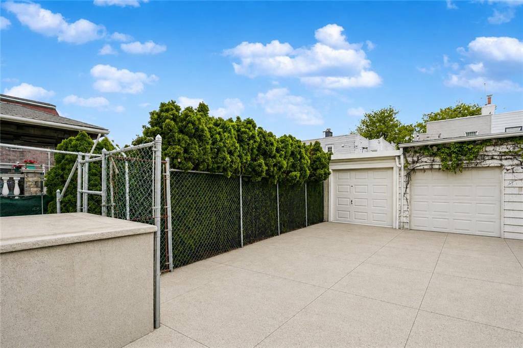 1352 Bay Ridge Parkway Brooklyn, NY 11228 - Photo 4 of 42 a backyard of a house with lots of green space