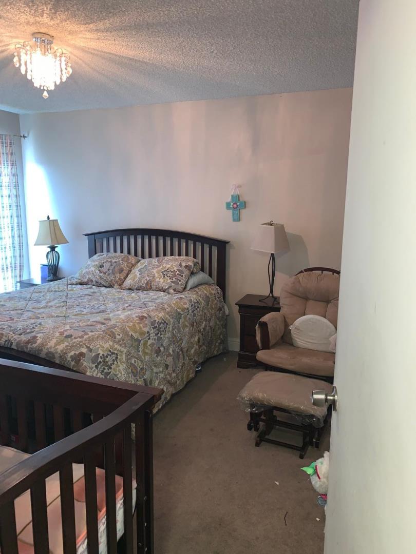 2043 Sierra Road, Unit 1 Concord, CA 94518 - Photo 18 of 34 a bedroom with bed and window