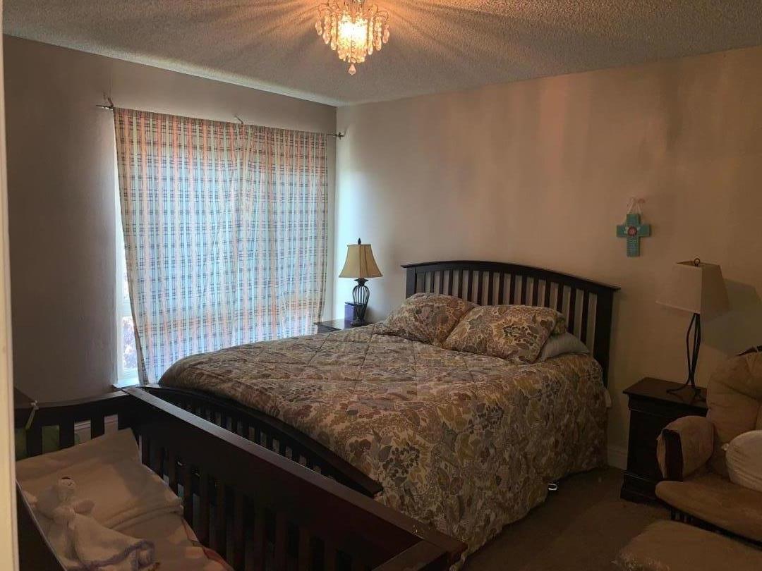 2043 Sierra Road, Unit 1 Concord, CA 94518 - Photo 19 of 34 a bedroom with a bed and window
