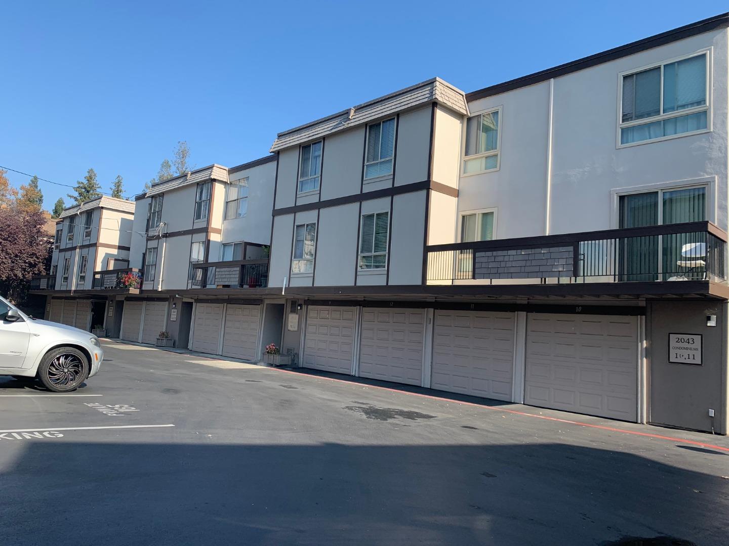 2043 Sierra Road, Unit 1 Concord, CA 94518 - Photo 3 of 34 a view of a street that has couple of cars parked in front of it