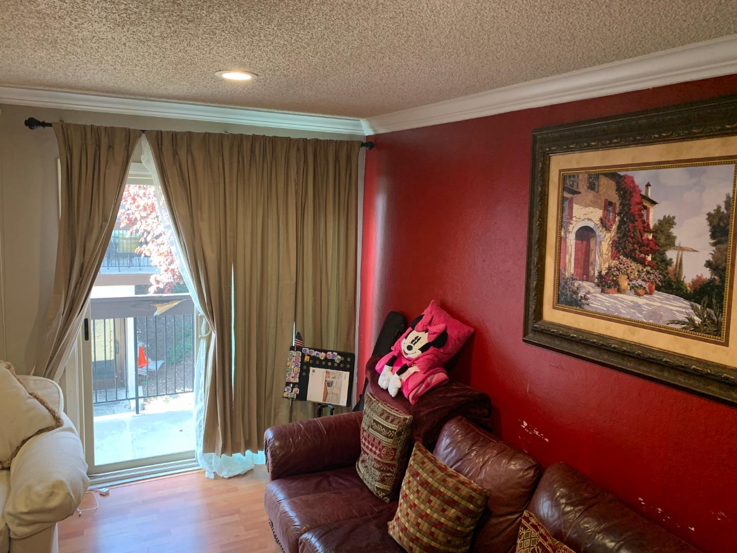2043 Sierra Road, Unit 1 Concord, CA 94518 - Photo 8 of 34 a living room with furniture and a large window