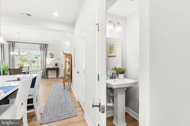 a very nice looking dining room with a table and chairs