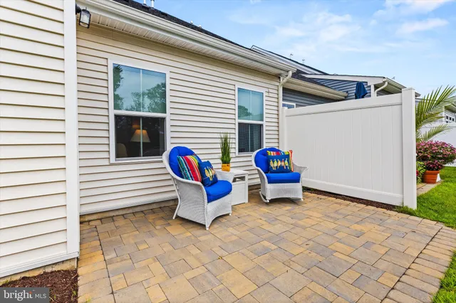 a view of swimming pool with a back yard