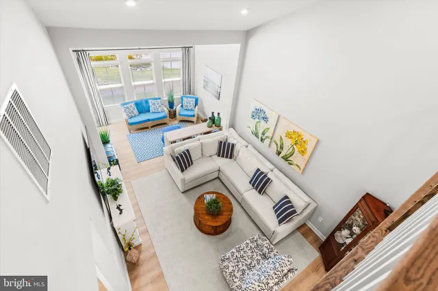 a bedroom with bed and a window