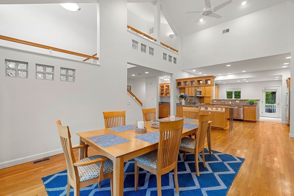 53 Gerald Road Marblehead, MA 01945 - Photo 10 of 42 a dining room with furniture and wooden floor