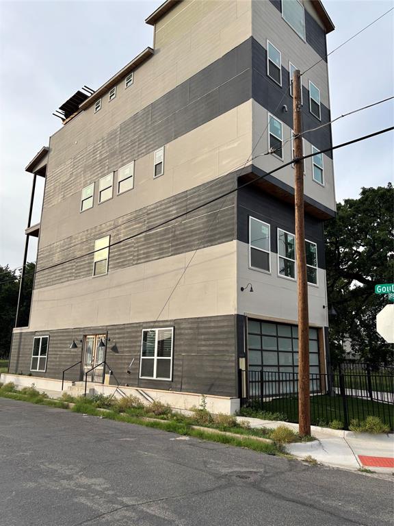 1401 Seegar Street Dallas, TX 75215 - Photo 1 of 17 a tall building on the side of a street