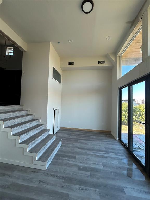1401 Seegar Street Dallas, TX 75215 - Photo 8 of 17 a view of a livingroom with wooden floor and window