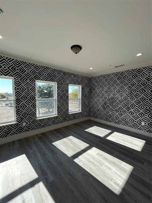 1401 Seegar Street Dallas, TX 75215 - Photo 10 of 17 a view of an empty room with wooden floor