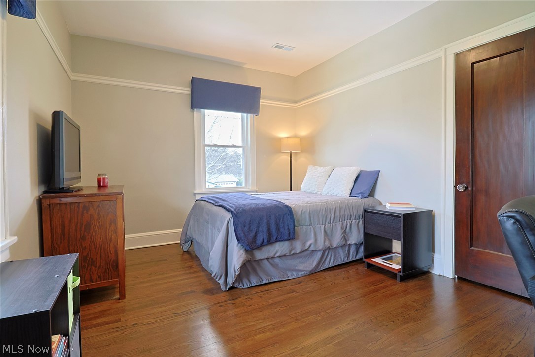 4376 Dover Center Road North Olmsted, OH 44070 - Photo 16 of 34 Bedroom with dark hardwood / wood-style floors