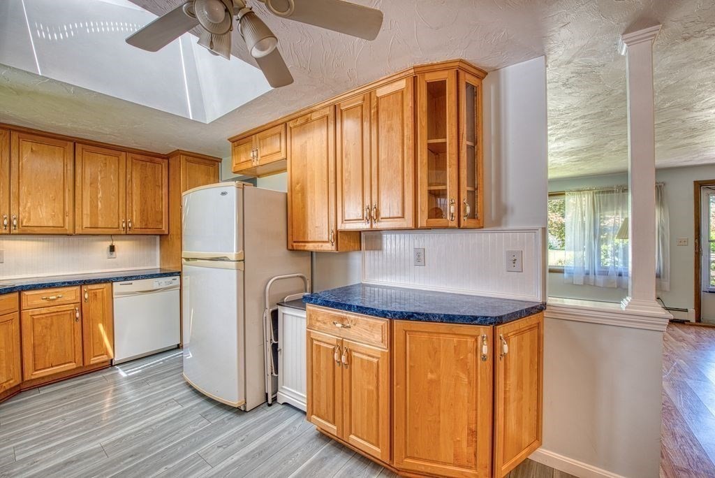 81 Errol Road Brockton, MA 02302 - Photo 21 of 31 a kitchen with refrigerator and window