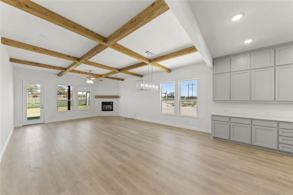 4017 Eagles Bluff Road Midlothian, TX 76065 - Photo 14 of 31 a view of an empty room with window and cabinet
